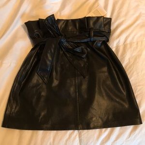 Never worn super cute faux leather skirt!